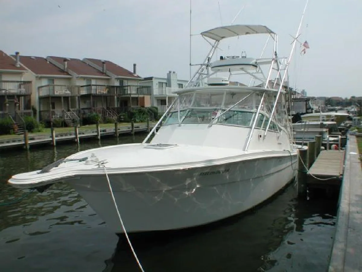 Topaz 32 Express 2000 boat specs